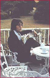 John Lennon has tea at Tittenhurst in 1971.