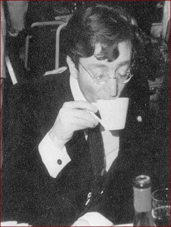 John Lennon sips a cup of tea, circa mid-1970s.