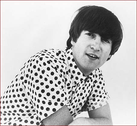 3: Polka Dot Smile. Here John Lennon looks pleasant enough as he poses in a casual white shirt with black polka dots in a 1965 photo session taken at his home in Kenwood in 1965. Even though this photo is not of the best quality, you can see the freckles on his arms (a fact that many photos of John do not reveal).
